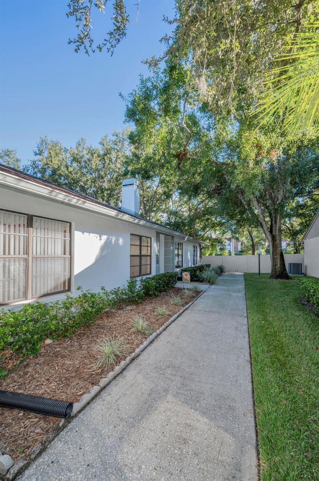 Photo of 3500 Magnolia Ridge Circle #405, Palm Harbor, FL 34684 (MLS # TB8524729)