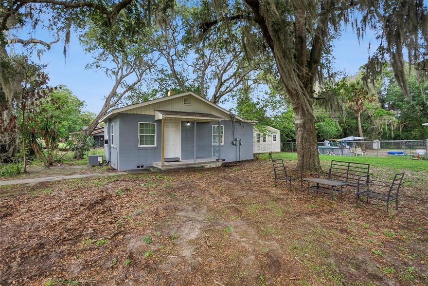 One or more photo(s) has been virtually staged. Charming and updated 2-bedroom, 1 full bath, 1 half bath bungalow situated on a large corner lot just minutes from historic Downtown DeLand, Stetson University, shopping, dining, and local parks. Whether you're looking for an investment property, your first home, or a convenient residence for a college student, this property offers incredible flexibility and value. Inside, you'll find an updated kitchen featuring newer stainless steel appliances (2025), spacious living areas, a walk-in closet, and both bedrooms have direct bathroom access, providing added convenience and functionality. Major updates include a newer roof (2021) and a brand-new HVAC system (2026), offering peace of mind for years to come. Located within DeLand's Historic District and positioned in a Qualified Opportunity Zone (QOZ), this property presents an exceptional opportunity for investors seeking to expand their rental portfolio or capitalize on future growth potential. With a renter already in place, it may offer immediate income-producing possibilities. Enjoy easy access to Downtown DeLand's vibrant shops, restaurants, and community events while being just minutes from campus. Don't miss this chance to own a well-maintained home in one of Central Florida's most charming and historic communities.