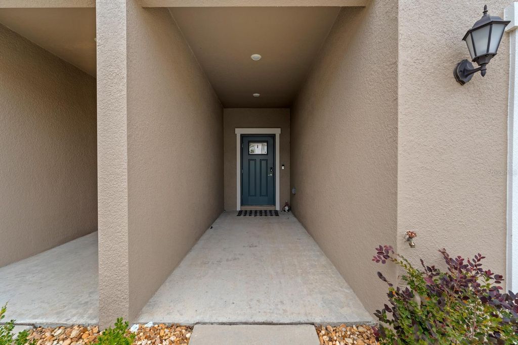 Photo of 10305 Trumpet Honeysuckle Way, San Antonio, FL 33576 (MLS # TB8454567)