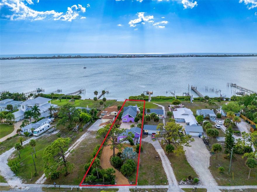 Indulge in the pinnacle of waterfront living with this charming Western exposure home with Lemon Bay Access, boasting some of the most captivating views in Southwest Florida. Whether you're a year-round resident, a host to visitors, an astute investor, or simply seeking a splendid winter retreat, this beautiful Englewood home presents an irresistible opportunity. From the moment you pull into the driveway, you will notice the mature tropical landscaping and meticulous attention to detail that went into this home. This old Florida home comprises three bedrooms, three bathrooms, a kitchen, a spacious living room, a formal dining room, a family room, a convenient inside laundry room, and a detached two-car garage with a workshop, and much more! Stepping inside, you'll be greeted by beautiful wood ceilings and beams that usher you into a sprawling, open-concept layout. The expansive kitchen features white shaker cabinets, granite countertops, tile flooring, stainless steel appliances, recessed lighting, pendant lights, bar top seating, a pantry, and much more! The 18x13 living room impresses with its tile flooring, fireplace, wood beams, and sliding glass door with captivating Lemon Bay views. The 18x13 formal dining room boasts ample space for a sizable dining table and water views. The 23x15 family room has history behind it and was from the old schoolhouse from Boca Grande. The Primary Suite is a sanctuary unto itself, showcasing a generously sized walk-in closet, pocket beautifully tiled walk-in shower, two separate vanities, updated lighting, and much more! The second bedroom features a tray ceiling, ceiling fan, and a private bathroom. Upstairs you will be greeted by a spacious third bedroom with a private bathroom and an additional loft room. The interior laundry room is complete with an extra closet for storage, tile flooring, washer, and dryer. The spacious detached two-car garage of this home features ample storage space and a 16x9 workshop area. Step outside, and you'll be greeted by a truly exceptional outdoor living area. The 16x13 under roof lanai features a ceiling fan and breathtaking views of Lemon Bay. The 16x11 outdoor porch is perfect for grilling or catching some sun. Did I mention that this home also has a 2022 roof, two 2024 Air Conditioners, hurricane shutters, and a dock on Lemon Bay? Enjoy your very own slice of paradise in Englewood with all the amenities you need from restaurants to beaches just right around the corner!