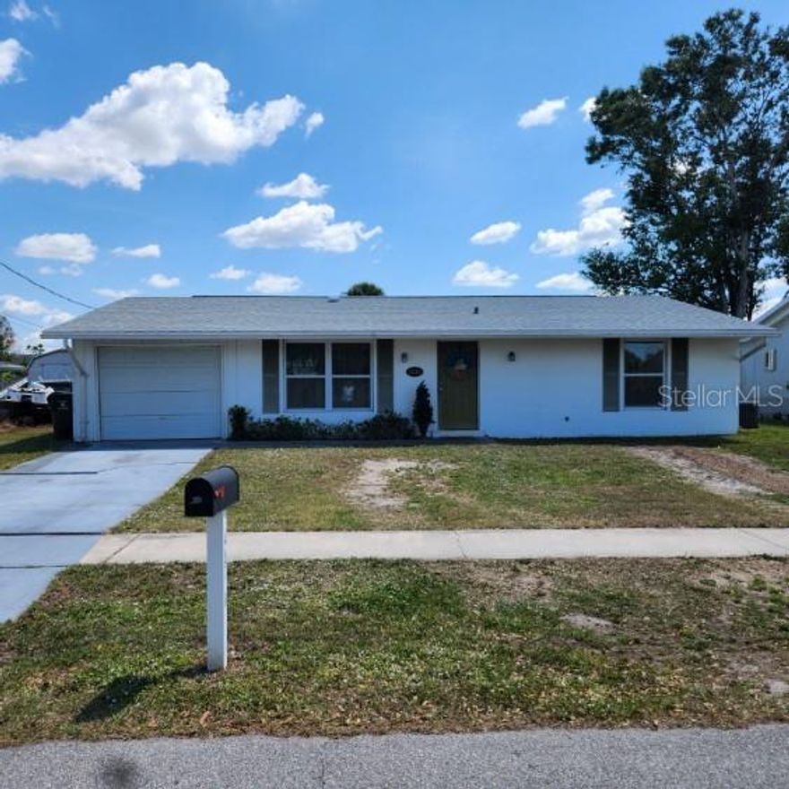Welcome to 4070 Grobe Street, a charming 2-bedroom, 2-bathroom single-family home nestled in the heart of North Port, Florida. Built in 1972, this 917-square-foot residence offers a comfortable living space on a 6,500-square-foot lot. The home boasts ceramic tile flooring throughout, enhancing its clean and cohesive aesthetic. The remodeled master suite provides a private retreat, while large windows invite an abundance of natural sunlight, creating a warm and inviting atmosphere. Recent updates include an air conditioning system that is just 8 months old, a new electrical panel, and newer windows. The roof was redone in 2024, adding to the home's durability. Notably, this property is free from HOA restrictions and is not located in a flood zone, offering peace of mind and flexibility. With city sewer and water services, the home ensures convenience and reliability. Its prime location places you close to a variety of restaurants, shopping centers, fishing spots, and the beautiful beaches of Southwest Florida, making it an ideal choice for those seeking both comfort and accessibility. This home is within walking distance of the Warm Mineral Springs, visited by people around the world. And Wellen Park is just down the road with all its new restaurants in shops and more being built, live music from 6:00 to 10:00 every night. North Port is a beautiful place to live and it's waiting for you!