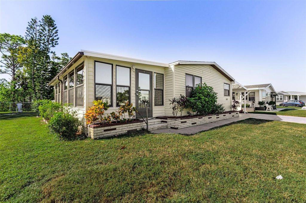 Photo of 521 San Clemente Circle, North Port, FL 34287 (MLS # TB8436590)