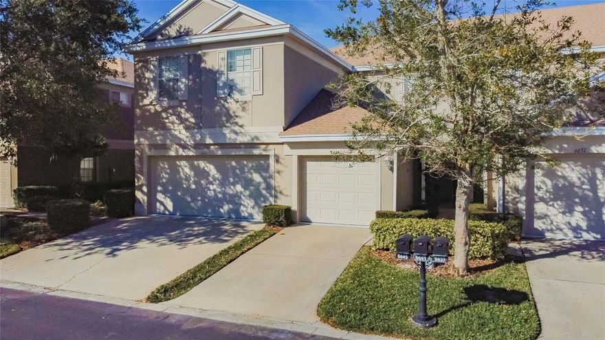 Located in the beautiful Park Place Townhomes Community, this 2 bedroom, 2.5 bathroom, 1 car garage townhome features an large eat-in kitchen, dining area, spacious living/family area, and a half bathroom on the first floor. Continue out to the screened porch to enjoy shaded privacy! The second floor features a large master bedroom with its own bathroom and a walk in closet. A second bedroom is right next to the second full bathroom. The laundry closet is equipped with a newer washer and dryer and is conveniently located in the hallway between the two bedrooms on the second floor. You will find this home to be energy efficient with a newer HVAC system and water heater. Nice neutral colors throughout with recent paint on the walls and a fresh coat on the trim. Floors are covered with clean neutral tile in the kitchen, bathrooms, and entryway and there is wood laminate in the living areas. Brand new paint in the garage and porch floors! This home is sparkling clean and ready for you to move in! The community pool is conveniently located across from the unit - just a short walk away.  The pictured appliances have been swapped out to stainless appliances.