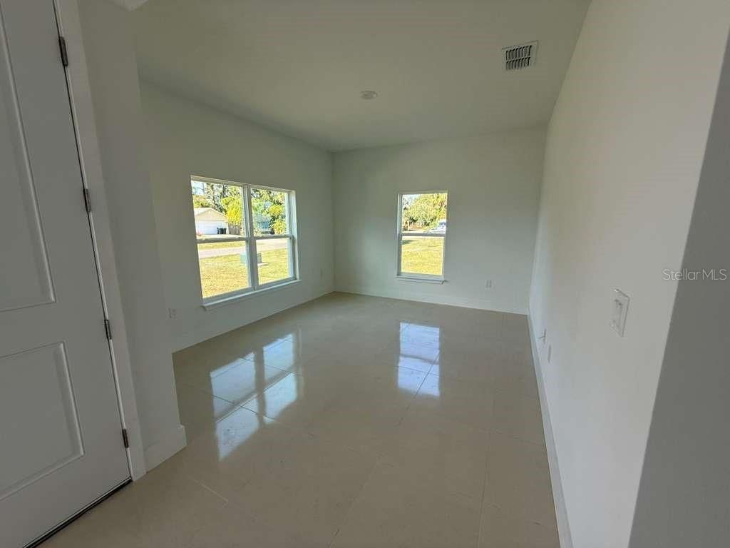 Photo of 239 Greenbrier Ave NW, Palm Bay, FL 32907 (MLS # S5123003)