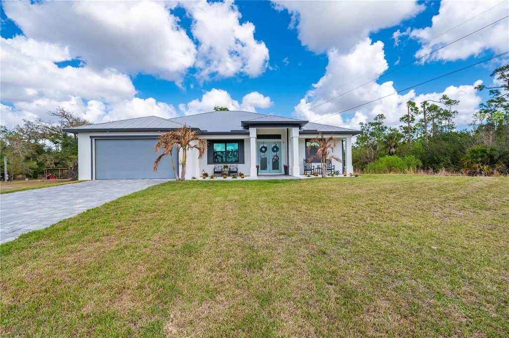 Photo of 4301 South Road, North Fort Myers, FL 33917 (MLS # C7523401)