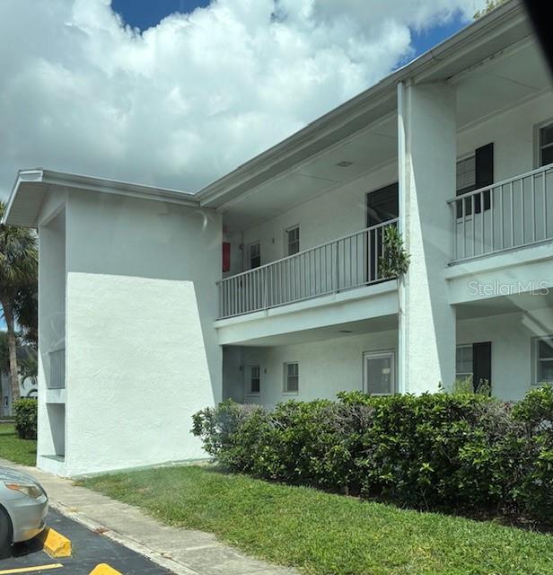 Fantastic opportunity to own a second-floor, all-ages condominium that is perfect for living year-round or as a rental property. With extremely low monthly dues of only $265, this fee includes all reserves along with your water, trash, sewer, and hot water, making this one of the best values around. The community is very well maintained and offers wonderful amenities including a heated pool, tennis courts, and shuffleboard. Built with solid concrete block construction, the property provides durability and peace of mind.
Inside, the unit has been freshly painted and offers an abundance of natural light. All carpeting and padding are brand new, while the kitchen features appliances that are one year old or newer, including the oven, refrigerator, and dishwasher. The air conditioning system was also replaced in 2024. Enjoy the fully windowed lanai all seasons with air conditioning featuring vinyl plank flooring and a generous sized storage room overlooking a serene courtyard with mature landscape. Laundry facilities are conveniently located on site and are coin operated. This pet-friendly community makes living here even more enjoyable.
For investors, this is an easy rental property with no condominium background check required for tenants. The unit was previously leased for $1,400 per month, offering strong rental potential. Please note that due to high investor ownership, conventional financing is not available, and all new owners must be approved by the association. The condominium is extremely well run making this a fantastic option for a primary residence, vacation getaway, or income-producing property.