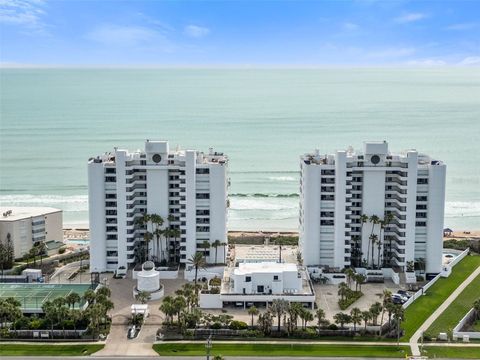 Photo of 5275 S Atlantic Avenue #406, New Smyrna Beach, FL 32169 (MLS # O6412342)