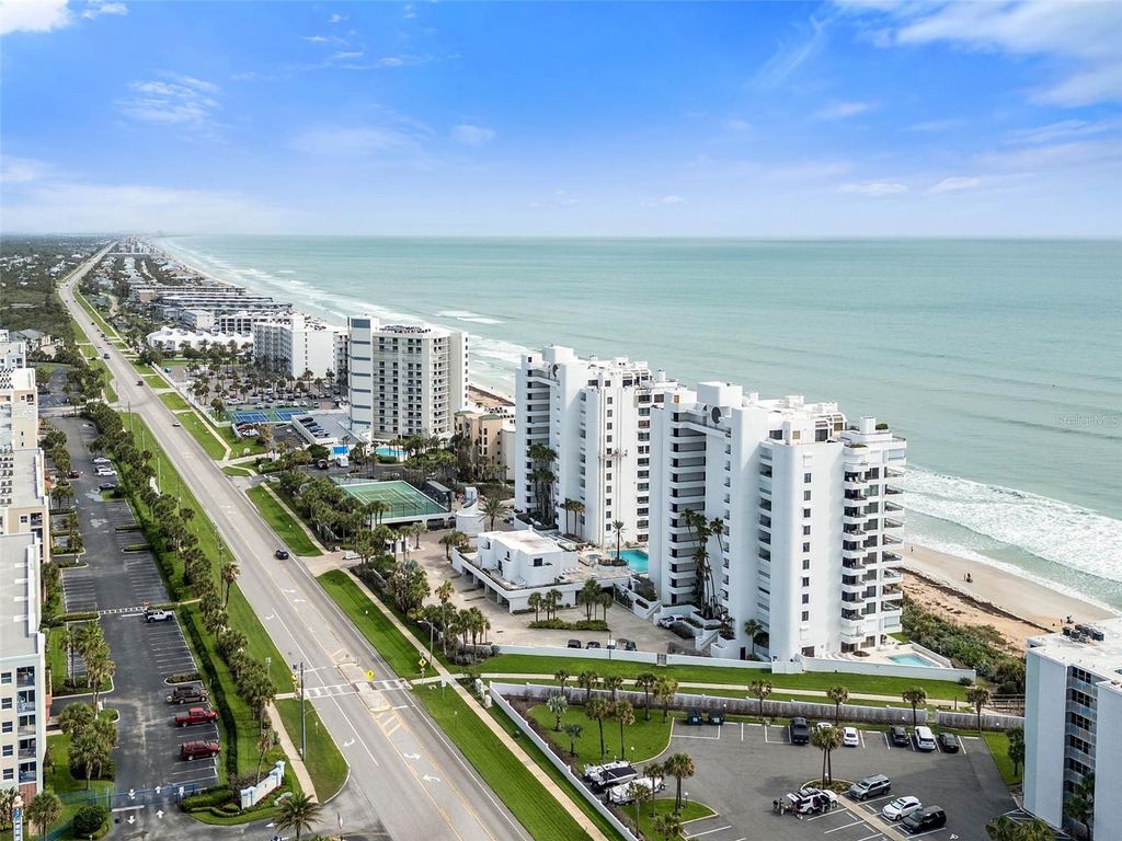 Photo of 5275 S Atlantic Avenue #406, New Smyrna Beach, FL 32169 (MLS # O6412342)
