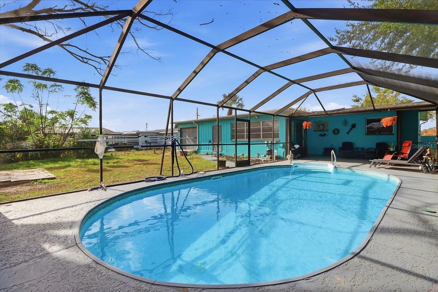 TURN-KEY POOL HOME that comes furnished...with 2 bedrooms, 2 bathrooms, a versatile Florida room, and WAIT...a HUGE 2-car garage with a convenient pull-through workshop area with tons of storage! This concrete block home has been thoughtfully updated throughout, featuring a 2022 roof, 2022 A/C & ductwork, whole-house solar (dependable electric bill), brand-new appliances, a new front door, along with updated lighting and ceiling fans. Fall in love with a freshly painted coastal interior and exterior and updated laundry room! Enjoy abundant parking options, a large fully fenced yard, and screened in lanai that is perfect for outdoor entertaining or relaxing by the pool. This prime-location property offers a flexible layout suited for a wide range of residential or business uses. Tucked away on a quiet dead-end street, yet conveniently close to shopping, dining, grocery stores, and everyday essentials. Outdoor enthusiasts will love the location—just 15–20 minutes to the Gulf in Crystal River or Rainbow Springs in Dunnellon, offering easy access to kayaking, fishing, boating, and Florida’s iconic spring-fed waters. A truly move-in-ready home that blends comfort, efficiency, and lifestyle. 
Close