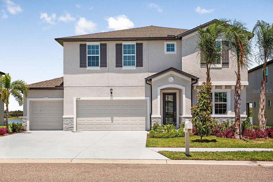 Dreaming of a new home with a water view which does NOT require flood insurance. This beautiful, move-in-ready Juniper home is the one to see! From the moment you arrive, this home will wow you with stunning views of the lake from the family room, kitchen, and owner’s suite. Not only do you have tranquil lake vistas, but you also have impact glass throughout, so you never have to worry about installing/removing hurricane shutters. This amazing home also features a three-car garage and a huge family room with abundant natural light. On the second floor, you have a privat e, spacious owner’s suite with a large loft area, plus three additional bedrooms and three full baths. This home is loaded with upgrades and is truly a must-see! Builder is offering up to $5000 in PAID closing cost incentives with use of Preferred Lender and  closed by year end 2023.   All room sizes are approximate.