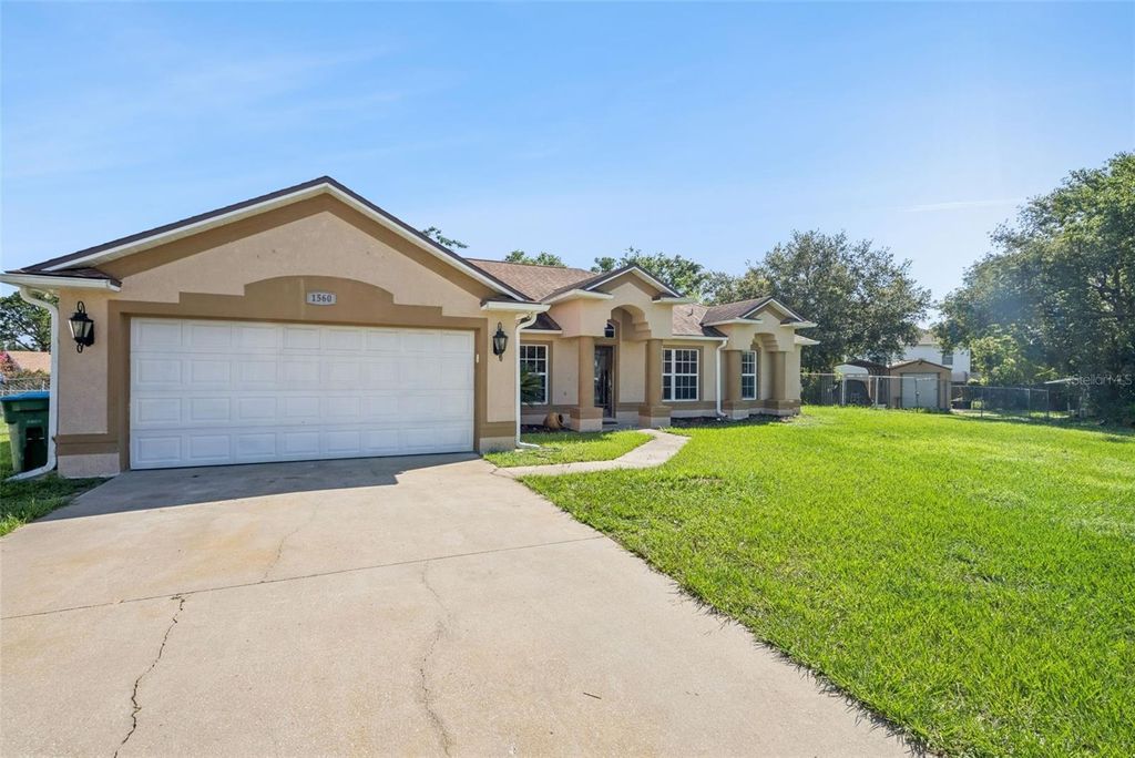 Photo of 1560 Gray Court, Deltona, FL 32738 (MLS # O6423340)