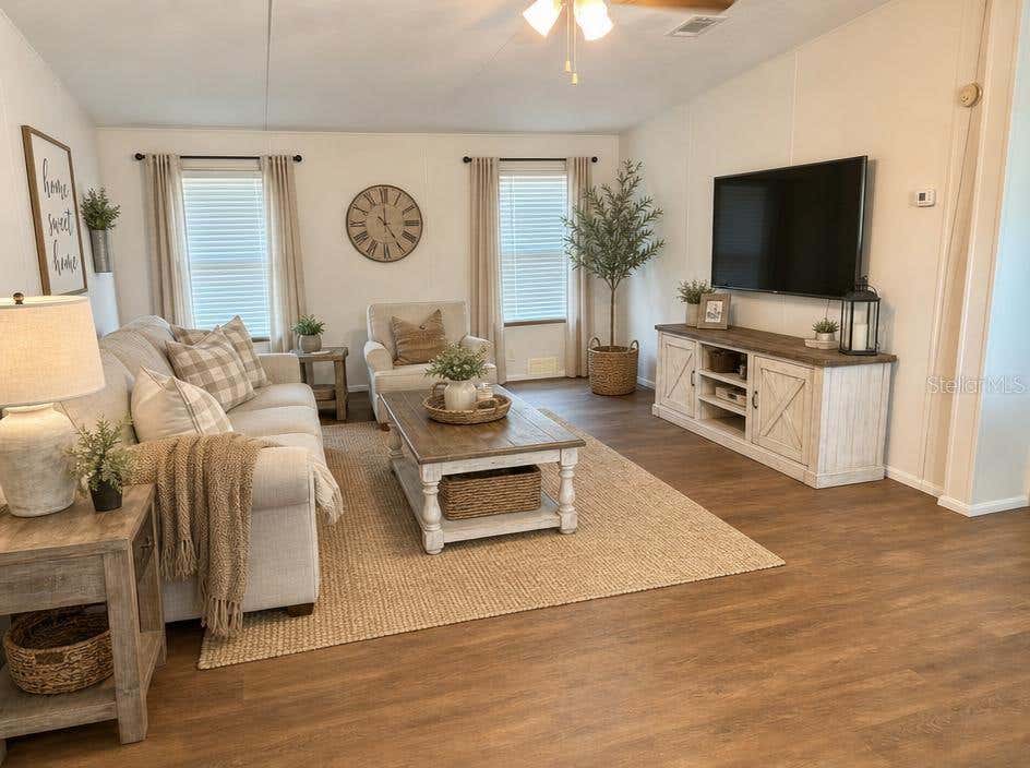 Photo of 6202 Pinewood Village Circle W, Lakeland, FL 33811 (MLS # TB8523158)