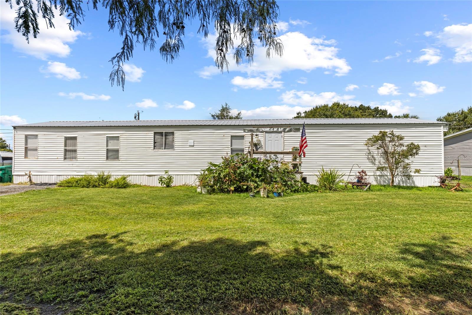 Completely Remodeled Interior! Don’t miss this updated 3-bedroom, 2-bath manufactured home located in the desirable Four Seasons Estates. Featuring a split bedroom floor plan, the home offers a spacious master suite with a large bathroom. Upgrades include brand new AC system. Enjoy the fully fenced yard with mature trees—perfect for privacy and outdoor living. Property is on well water and septic. Conveniently situated just outside of town, offering the best of quiet country living with easy access to amenities. Home is currently occupied; appointments are required for showings.