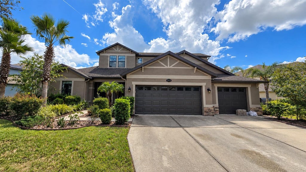 Photo of 10619 Mistflower Lane, Tampa, FL 33647 (MLS # TB8540400)