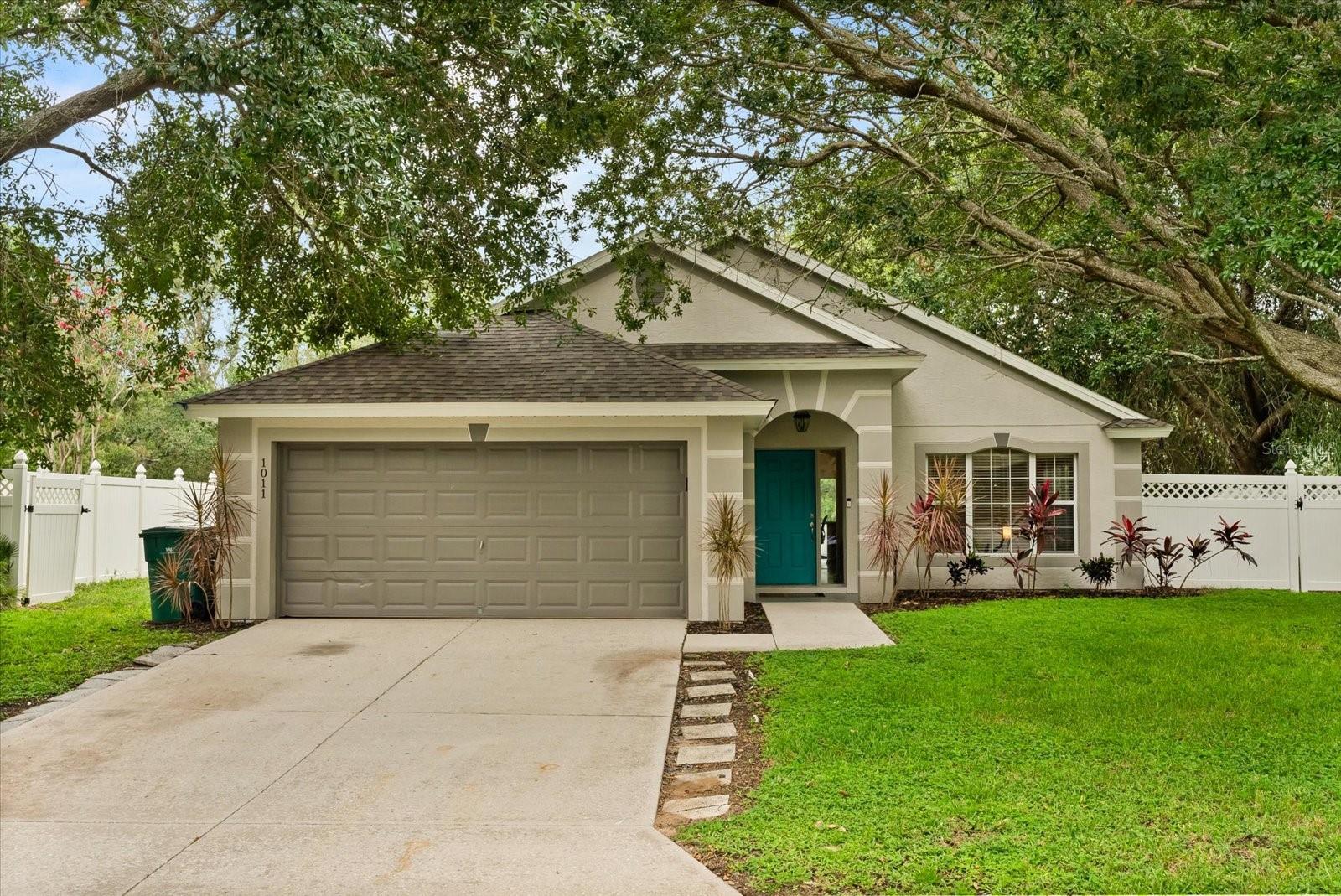 Tucked away in a quiet Eustis neighborhood with no rear neighbors, this inviting 3-bedroom, 2-bath home offers the perfect blend of comfort, privacy, and Florida lifestyle (photos 3-6 have been virtually staged). Light and bright open floor plan with vaulted ceilings, fresh interior and exterior paint, and timeless solid wood cabinetry. The layout flows easily from the kitchen’s eat-in space to the bright living area and out to a screened-in lanai, where a sparkling in-ground pool and fenced backyard and no rear neighbors . Perfect weekend lounging or entertaining. With a newer roof (2022) and newer AC, the major updates are already done. Located just minutes from the charm of historic Mount Dora and with quick access to the 429, this home delivers small-town serenity with big-city convenience.