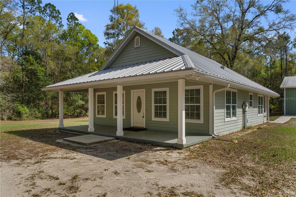 Photo of 6979 NE County Road 340, High Springs, FL 32643 (MLS # GC538619)