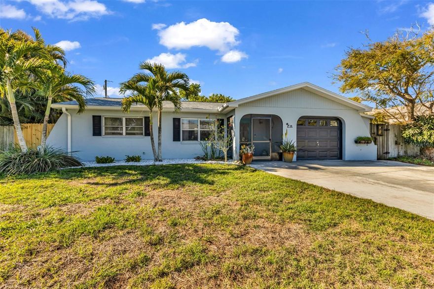 This beautifully updated 3-bedroom, 2-bath South Venice residence offers an exceptional blend of location, versatility, and coastal lifestyle—highlighted by a truly rare supersize 32’ x 23’ enclosed rear lanai. This expansive space adds approximately 736 square feet of additional living area, bringing the total to 1,861 square feet, and creates the ultimate indoor-outdoor Florida retreat. Designed for both relaxation and entertaining, the lanai features newer epoxy travertine-look flooring for effortless maintenance and a fully equipped outdoor kitchen—perfect for hosting or unwinding year-round. Inside, the home has been tastefully updated with luxury vinyl flooring in the main living areas and kitchen, complemented by natural stone countertops. Major improvements include a NEW ROOF (2025), NEW WATER HEATER (2025), septic system replacement (2020), and upgraded water treatment system offering peace of mind for years to come. Additional highlights include a fully fenced yard and a convenient 16’ x 3’ attached storage shed for added functionality. Ideally located less than 3 miles from the beautiful shores of Manasota Key Beach and just a short drive to historic downtown Venice, where boutique shopping, sidewalk cafés, and vibrant events await. Residents that own in South Venice enjoy the exclusive option to join the South Venice Beach Ferry for a low $200 annual fee, providing access to exclusive amenities including ferry service to a private beach on Manasota Key, a private boat launch, and storage for kayaks, canoes, and paddleboards. With NO CDD fees, NO deed restrictions, and NO HOA, this property offers the freedom to fully embrace the Florida lifestyle—whether boating, fishing, golfing, or simply enjoying your own private paradise.