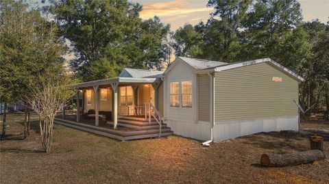 Photo of 9410 SW 156th Place, Dunnellon, FL 34432 (MLS # OM716496)