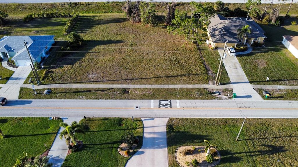 Photo of 489 Boundary Blvd, Rotonda West, FL 33947 (MLS # D6145734)