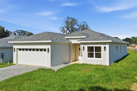 Photo of 1324 Marshall Drive, Leesburg, FL 34748 (MLS # O6429391)