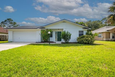 Photo of 13 Whittington Drive, Palm Coast, FL 32164 (MLS # FC309578) Photo of 13 Whittington Drive, Palm Coast, FL 32164 (MLS # FC309578)