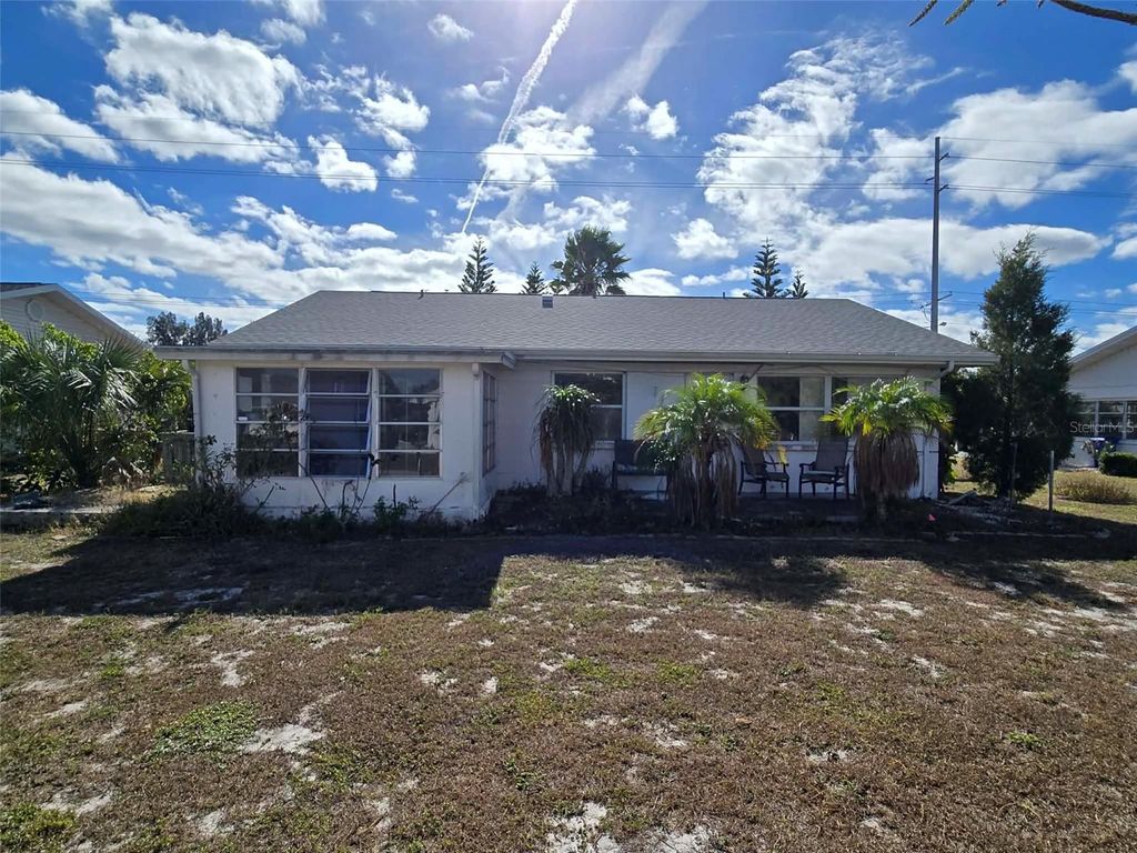 Photo of 211 Rickenbacker Drive, Sun City Center, FL 33573 (MLS # O6369425)
