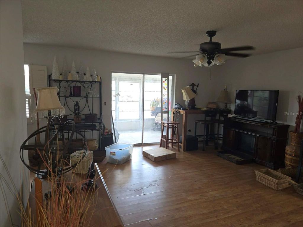 Photo of 211 Rickenbacker Drive, Sun City Center, FL 33573 (MLS # O6369425)