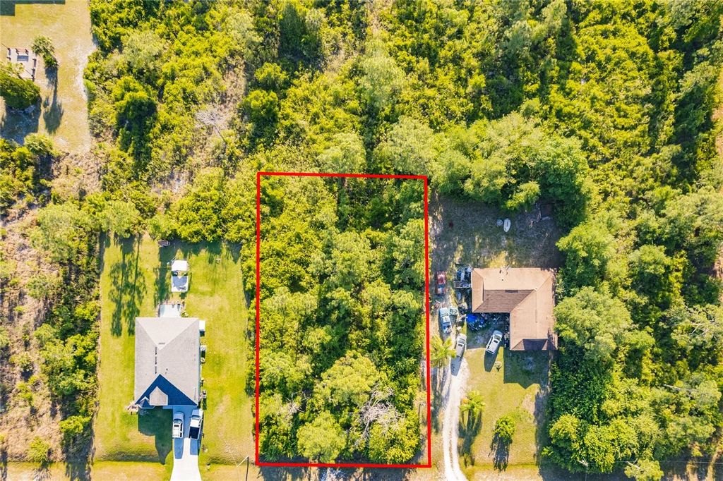 Photo of 904 Poinsettia Avenue, Lehigh Acres, FL 33972 (MLS # O6343561)