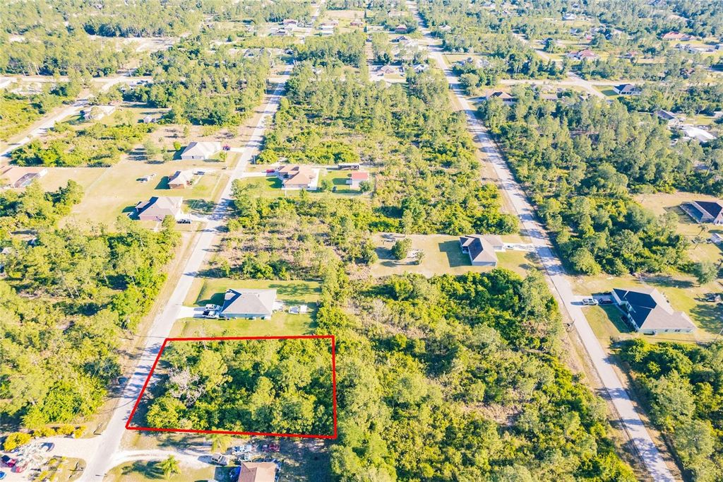 Photo of 904 Poinsettia Avenue, Lehigh Acres, FL 33972 (MLS # O6343561)