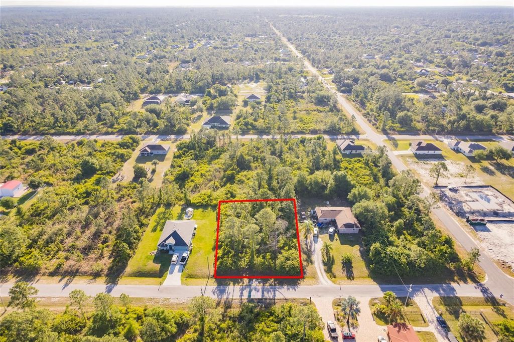 Photo of 904 Poinsettia Avenue, Lehigh Acres, FL 33972 (MLS # O6343561)