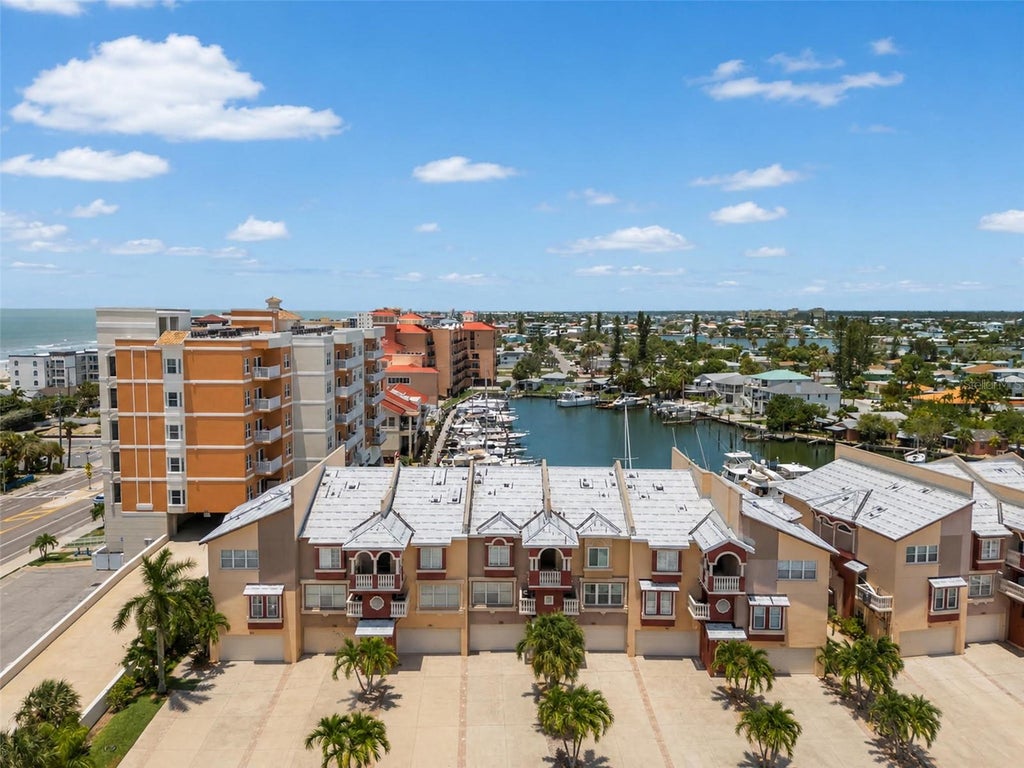 Photo of 116 131st Avenue E #F, Madeira Beach, FL 33708 (MLS # TB8531358)