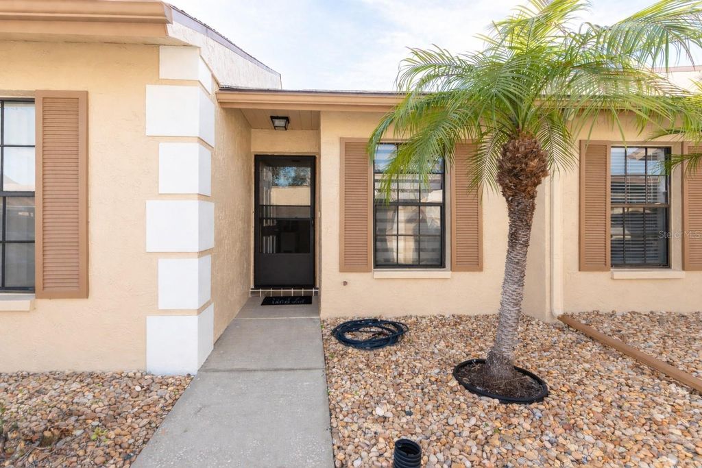 Photo of 1833 Rising Sun Drive, Holiday, FL 34690 (MLS # TB8468765)