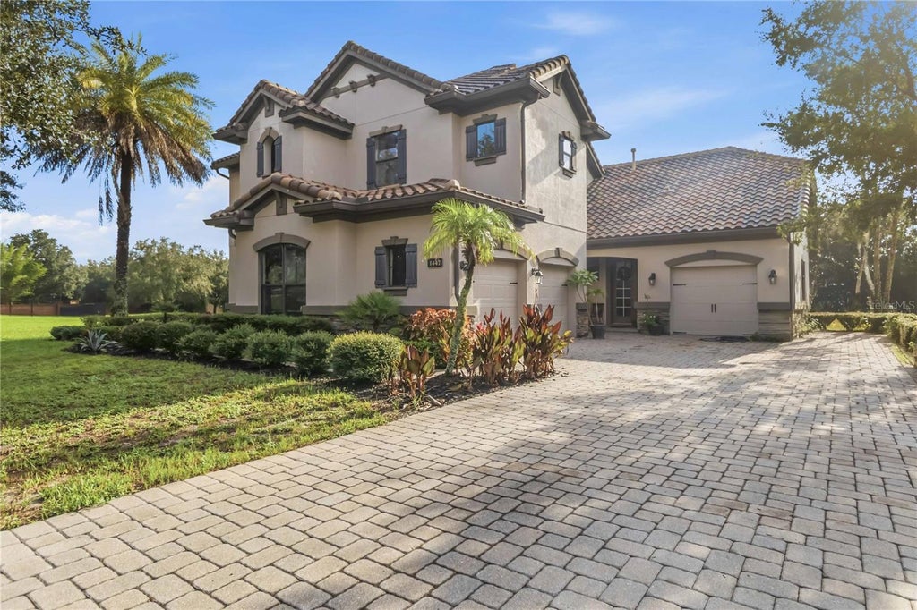 Photo of 1447 Dunbrooke Loop, Longwood, FL 32779 (MLS # O6449150)
