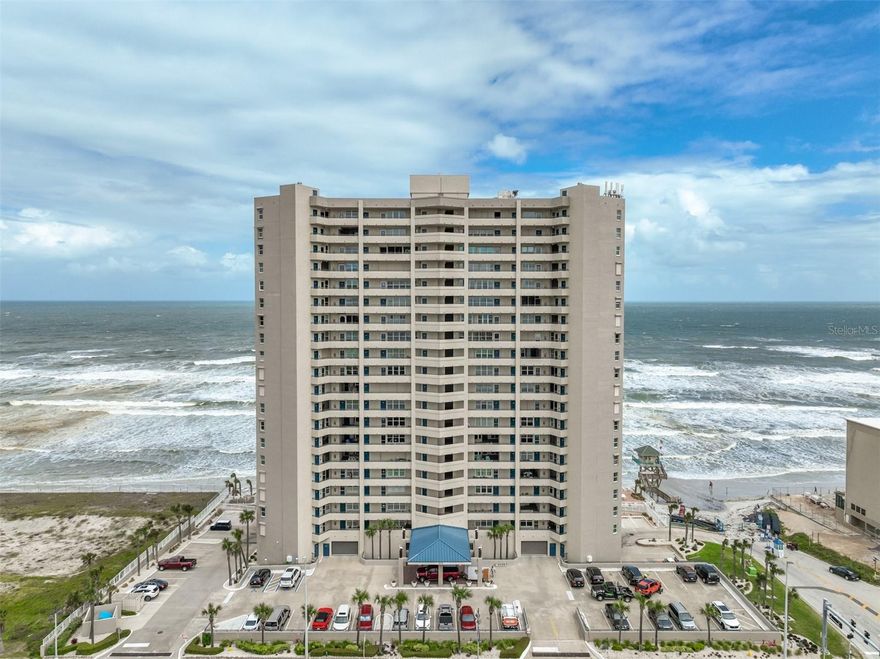 AN EXCLUSIVE UNRIVALED OFFERING THAT IS IMPECCABLY EXECUTED WITH THE FINEST UPGRADES! **LUXURIOUS FEATURES AT EVERY TURN**OFFERING STUPENDOUS DIRECT OCEANFRONT SOUTHEAST CORNER VIEWS**THIS IS A RARE OFFERING! -MESMERIZING VIEWS FROM EVERY ROOM-

TOWERS TEN MAJESTICALLY TOWERING 22 STORIES & IS ONE OF THE MOST ICONIC BUILDINGS IN DAYTONA BEACH SHORES SET OF THE BACKDROP OF THE WORLD’S MOST FAMOUS BEACH! *2-WEEK RENTALS PERMITTED. PET FRIENDLY. 

DELIVERED FURNISHED, THIS BEACHFRONT OASIS IS A DREAM**WOODGRAIN PLANK TILE FLOORING THROUGHOUT FOR A WONDERFUL EASY-BREEZY LIFESTYLE OF FLIP FLOPS AND BEACH DAYS. ENTER A LARGE FOYER (Previously a lanai) AND GET READY TO SAY WOW! EVERYTHING WAS PAINSTAKINGLY PLANNED AND EXECUTED WITH THE FINEST CRAFTSMAN. 


IDEAL FOR ENTERTAINING, THIS OCEANFRONT HAVEN BOASTS A RECONFIGURED NEW KITCHEN WITH SLEEK AND SEXY CAMBRIA QUARTZ COUNTERTOPS INCORPORATED WITH GREY VEINING, CONTEMPORARY SUBWAY TILE BACKSPLASH, AND WHITE RAISED PANEL CABINETRY WITH SOFT CLOSE DRAWERS, PULL-OUTS, BLACK GOOSENECK FAUCET, & LUXURY BLACK HARDWARE OFFERING THE LATEST, SLEEK, LOOK. FARMHOUSE SINK, & SEPARATE ICE MAKER. THE KITCHEN AFICIONADO WILL ENJOY THE SLEEK AND REFINED KITCHENAID® PREMIER SUITE* APPLIANCES.

ENJOY BEACHFRONT LIVING AND SIP A MARGARITA AT YOUR DINING ROOM TABLE. BOASTING FARMHOUSE FLAIR AND COMPLIMENTED BY A STYLISH BLACK RECTANGULAR CHANDLER WITH AN OPEN FLAME DESIGN EVOKING CHARM & AMBIANCE. PLANATION SHUTTERS AND A WIDE-OPEN FLOOR WITH A LIGHT-BRIGHT FEEL. THE DIRECT OCEANFRONT LIVING ROOM OFFERS CORNER WINDOWS AND A FLOOR-TO-CEILING SLIDERS CAPTURING ALL- ENCOMPASSING BEACHFRONT VIEWS, VIEWS, VIEWS!  

20’ LONG PRIMARY BEDROOM WITH BALCONY ACCESS, WALK IN CLOSET AND TANTALIZING VIEWS! RELAX AND REJUVENATE IN THE SPA INSPIRED PRIMARY BATH. FEATURING A REDESIGNED OASIS**

EXQUISITELY EXECUTED, THE PRIMARY BATH HAS BEEN RECONFIGURED AND THE SHOWER IS THE *JEWEL OF THIS MASTERPIECE OASIS. WHITE, *SHINY, WAVE TILE, REMINISCENT OF OCEAN WAVES HUGS THE WALLS, *PEBBLE TILE FLOORING WITH GREY AND WHITE HUES, AND A *DRAMATIC FLOOR-TO-CEILING **EMERALD BLUE FEATURE**WALL WITHIN THE SHOWER WITH AN IRIDESCENT HUE THAT IS *SEXY & SLEEK. DOUBLE SHOWER HEADS, DOUBLE SINKS, QUARTZ COUNTERS. **SHEER PERFECTION AT EVERY TURN.

UPDATED AND RECONFIGURED GUEST BATHROOMS ADORNED WITH CHEVRON PATTERNED GLASS ENCLOSED SOAKING TUB WITH DESIGNER GRADE BLACK FIXTURES. BOTH GUEST BEDROOMS ARE ON THE OPPOSITE WING TO ENSURE PRIVACY, ONE WITH ENSUITE, AND HAVE INCREDIBLE OCEAN & RIVER VIEWS. GLASS SHOWER IN THIRD BATHROOM WITH *CUSTOM WATERFALL BLUE TILE WITH A FUN WHIMSICAL DESIGN. EXTRA TALL CABINETRY, ALL NEW LIGHT FIXTURES. *NEW HOT WATER HEATER, *NEW FIXTURES THROUGHOUT *CUSTOM WOOD SHELVING IN CLOSETS *NEW OUTDOOR AC* NEW FLOORING, *PAINT ETC.

REMODELED LOBBY** STATE OF THE ART FITNESS CENTER, OCEANFRONT SOCIAL ROOM, WITH BILLIARD, HEATED OCEANFRONT POOL WITH SPA AND WATERFALL FEATURE, INCLUDING LOUNGE AREAS ON THE SUN DECK, BBQ GRILLS, AND A SERENE GARDEN/FIREPIT SITTING AREA SURROUNDING A GLASS FENCE TO ENJOY THE WAVES EFFORTLESSLY. SECURE UNDERGROUND PARKING.

OWNERSHIP HAS INVESTED HEAVILY, COMPLETING MAJOR 2024 INFRASTRUCTURE UPGRADES, INCLUDING A NEW SEAWALL, NEW FENCING, POOL/SPA MODERNIZATION, AND NEW GRILLS. All information intended to be accurate but should be verified at your discretion.