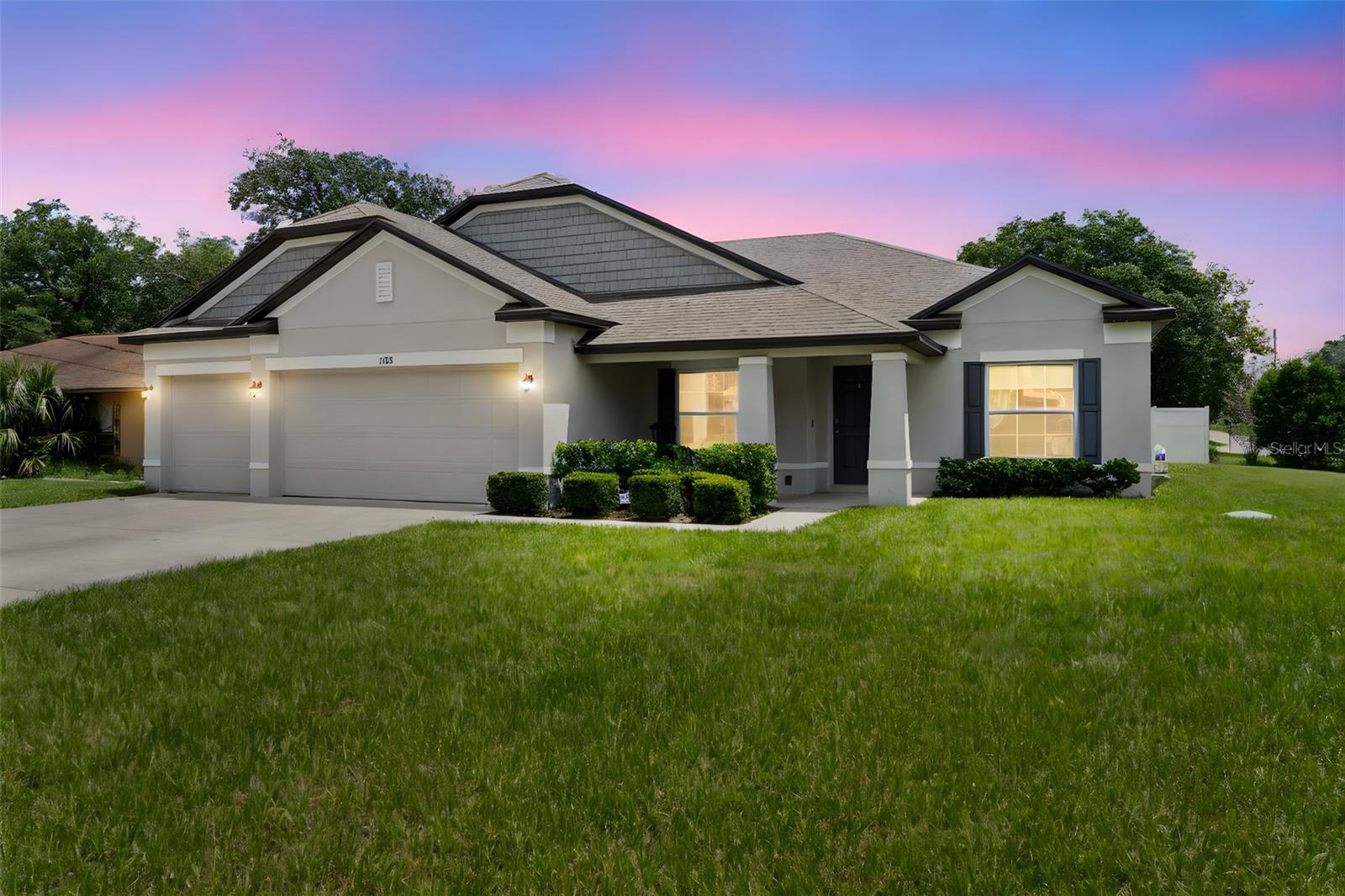 Why wait to build when you can move right into this well maintained, nearly new home? With ASSUMABLE FHA financing available for qualified buyers, this is a rare opportunity to step into your dream home with ease and affordability.
Built just three years ago and situated on a large corner lot, this spacious residence offers 2,444 square feet of thoughtfully designed living space, featuring four bedrooms and three full bathrooms. The flexible floor plan also includes a versatile bonus room that can serve as a home office, den, or playroom—perfect for today’s lifestyle.
Entertain with ease in the formal dining room, or enjoy everyday living in an open-concept layout that seamlessly blends living, kitchen, and dining areas. The split-bedroom design ensures privacy for the primary suite and guests alike.
The luxurious primary suite is your personal retreat, generously sized and complete with dual closets and an en-suite bath with a soaking tub and separate walk-in shower. All three secondary bedrooms are spacious, one of them having its own private en-suite bath, ideal for guests or multigenerational living.
Additional highlights include a dedicated laundry room and planning center. This home offers plenty of room to grow and gather, and peace of mind with a transferable structural warranty.