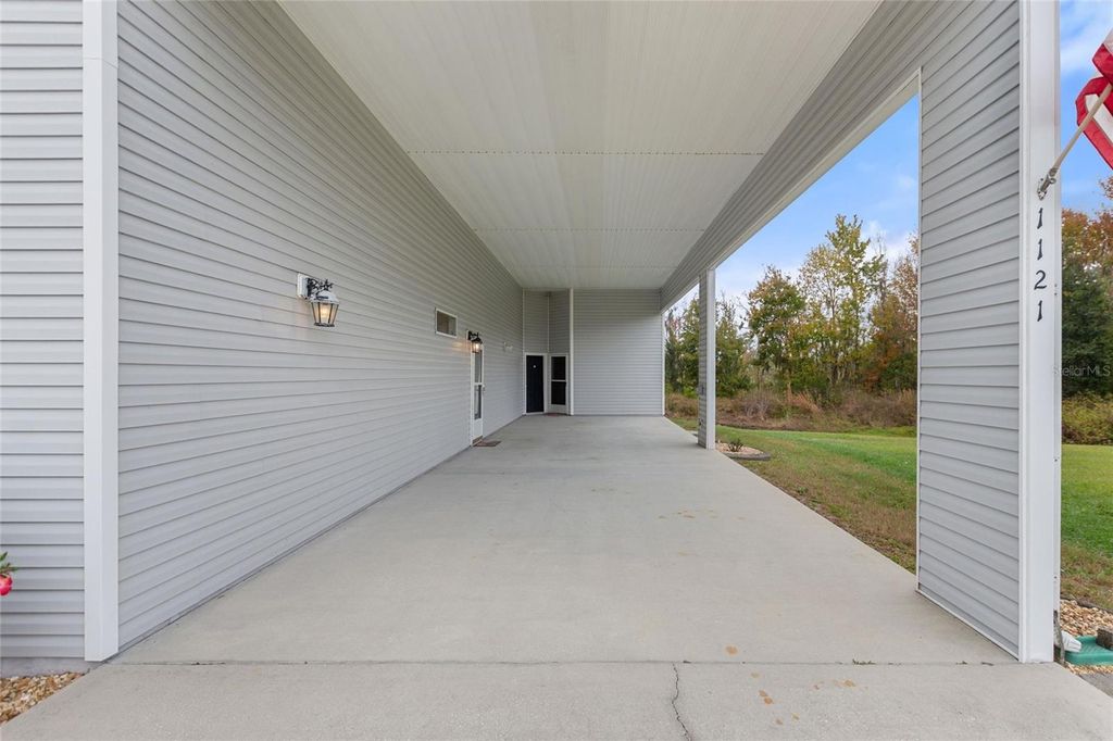 Photo of 1121 Motorcoach Drive, Polk City, FL 33868 (MLS # L4957986)