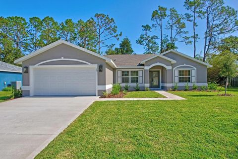 Photo of 72 Bunker Hill Drive, Palm Coast, FL 32137 (MLS # FC318951)