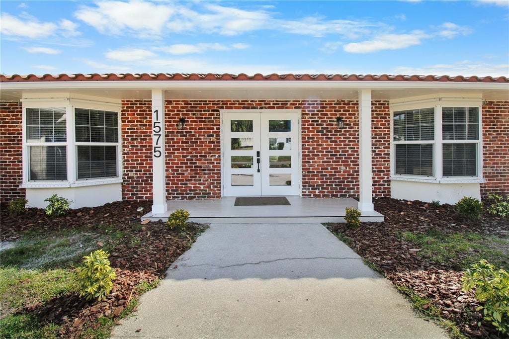 Photo of 1575 Brookside Boulevard, Largo, FL 33770 (MLS # TB8562891)