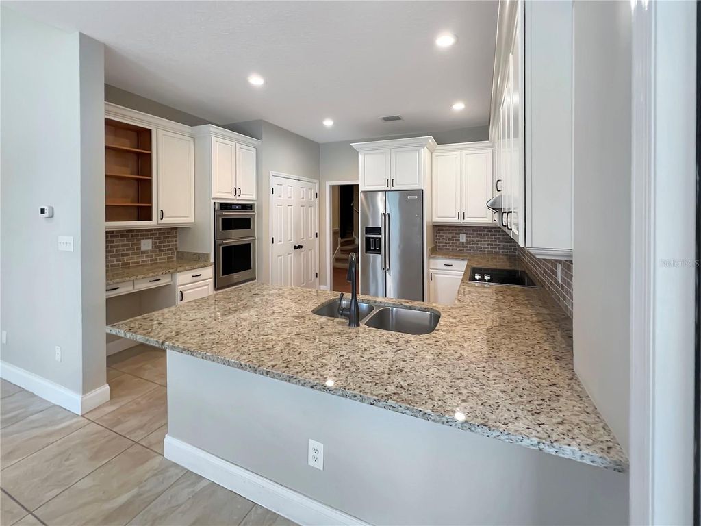 Photo of 8537 Redleaf Lane, Orlando, FL 32819 (MLS # O6399287)