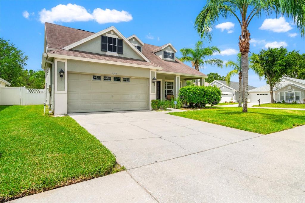 Photo of 17342 Lawn Orchid Loop, Land O Lakes, FL 34638 (MLS # TB8395394)