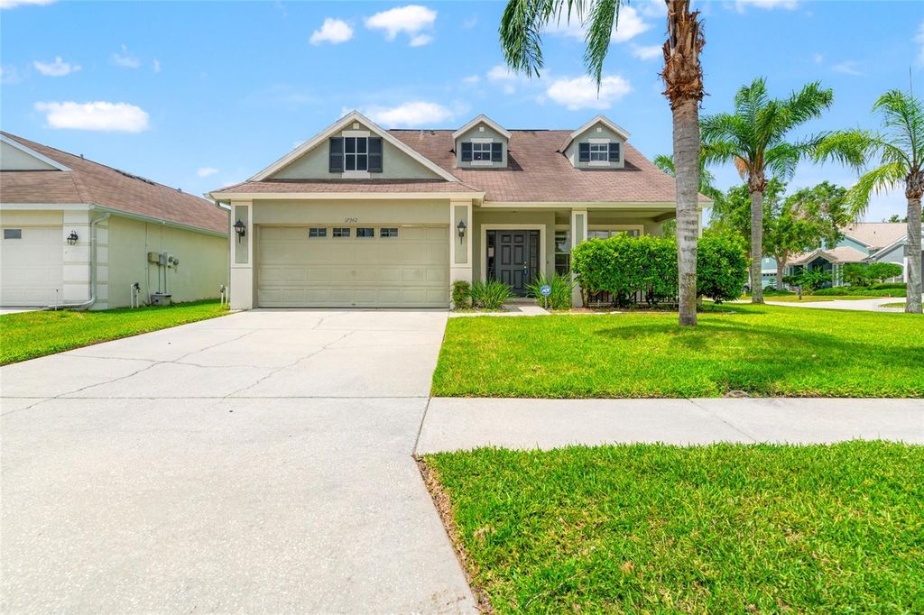 Photo of 17342 Lawn Orchid Loop, Land O Lakes, FL 34638 (MLS # TB8395394)