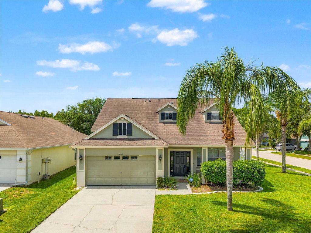 Photo of 17342 Lawn Orchid Loop, Land O Lakes, FL 34638 (MLS # TB8395394)