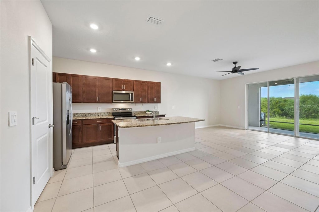 Photo of 8657 Milestone Drive, Sarasota, FL 34238 (MLS # A4703365)