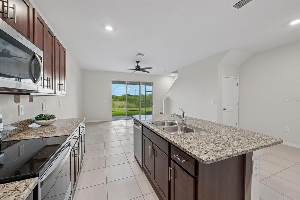 Photo of 8657 Milestone Drive, Sarasota, FL 34238 (MLS # A4703365)