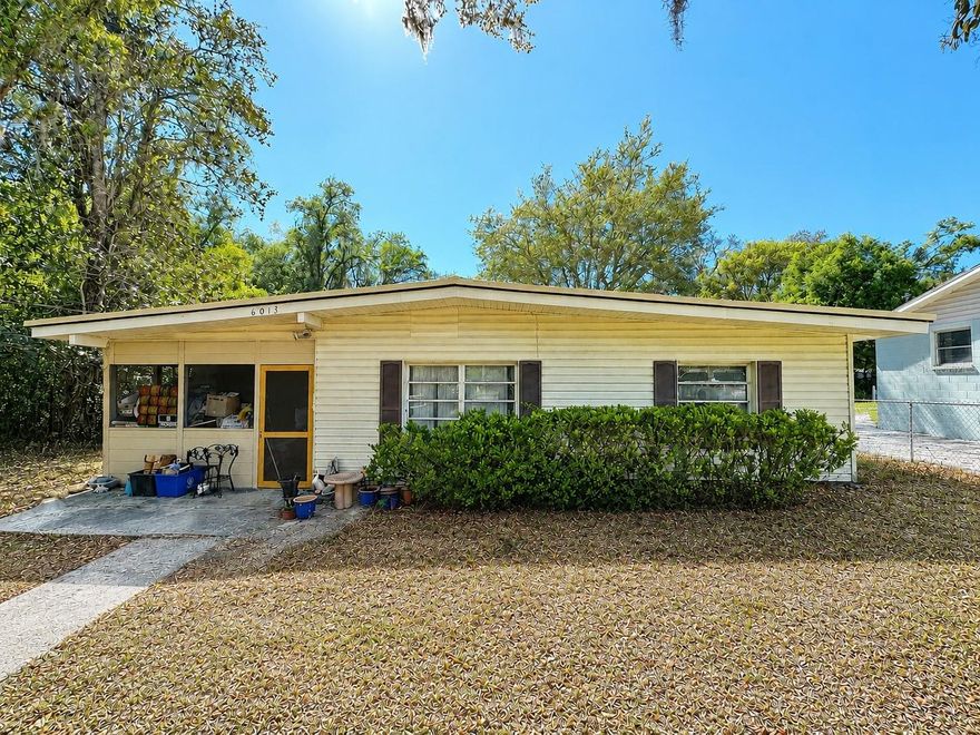 One or more photo(s) has been virtually staged. PRICE REDUCED!! SELLER IS MOTIVATED!! Additional interior photos added - more photos coming soon. This charming 2 bedroom, 2 bathroom home with tons of potential is ready for its new owners. The home sits on .35 acres, and backs up to a large retention pond adding an extra level of privacy. As you approach the home, you’re welcomed by a spacious front porch, which also conveniently houses the washer and dryer. Inside, the home offers a functional layout with plenty of potential to make it your own. Recent updates provide peace of mind, including a new HVAC system (2023), partial roof replacement (2026), and a newly replaced well pump and piping (2026). Both bathrooms were renovated ~3 years ago and feature stylish wood-look tile, updated vanities, toilets, shower/tub combination in the main bathroom, and a relaxing jacuzzi-style tub in the guest bathroom. Outdoor features truly set this property apart. A 18X26 WORKSHOP equipped with both power and water offers endless possibilities for hobbies, storage, or workspace needs. The workshop also has the potential to be converted into a private in-law suite, offering flexible living space for extended family, guests, or even potential rental income. The backyard also includes a spacious carport, adding extra convenience. Ideally located near Ridge Manor Community Park, this home combines space, privacy, and functionality—with the added benefit of no HOA. Don’t miss this opportunity to own a property with room to grow and make your own!