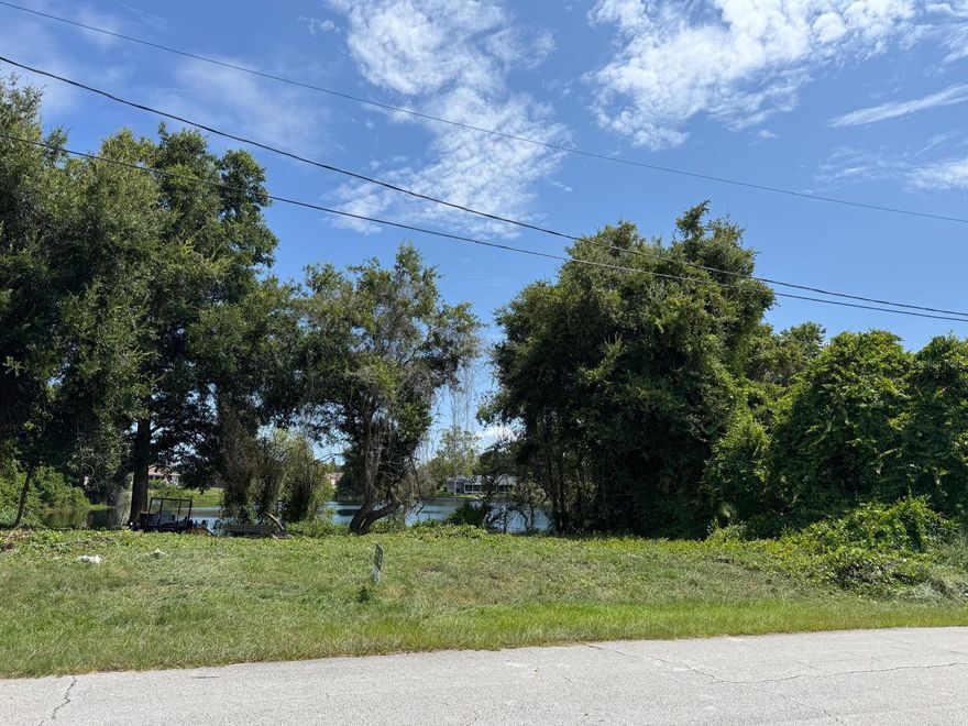 Vacant lot with water view in residential area of Deltona. The property offers 95 feet of frontage with south exposure and totals approximately 0.18 acres. Easy access to schools, shopping and major highways. It is only about 6 miles from I 4. You’ll be conveniently located between Orando and Daytona Beach with only 28 miles from each. Come take a look!