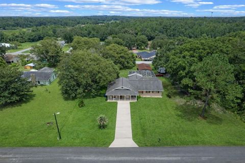 Photo of 7484 Redbud Lane, Brooksville, FL 34601 (MLS # V4948278)