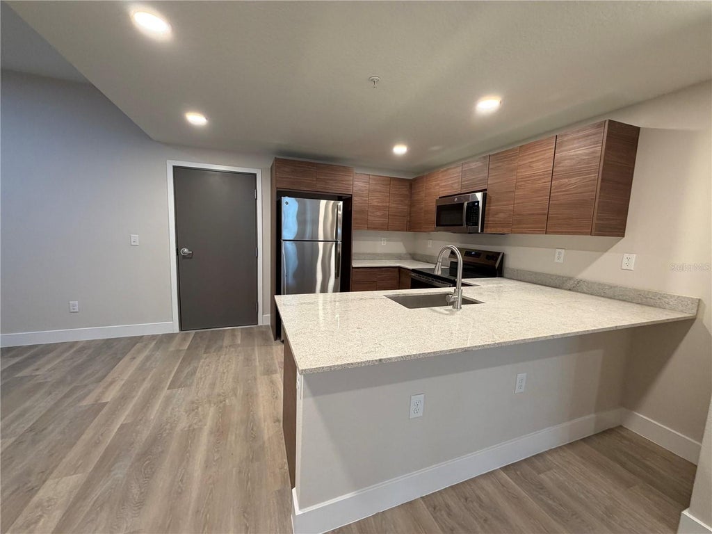 Photo of 4424 S Texas Avenue #1-209, Orlando, FL 32839 (MLS # O6448415)