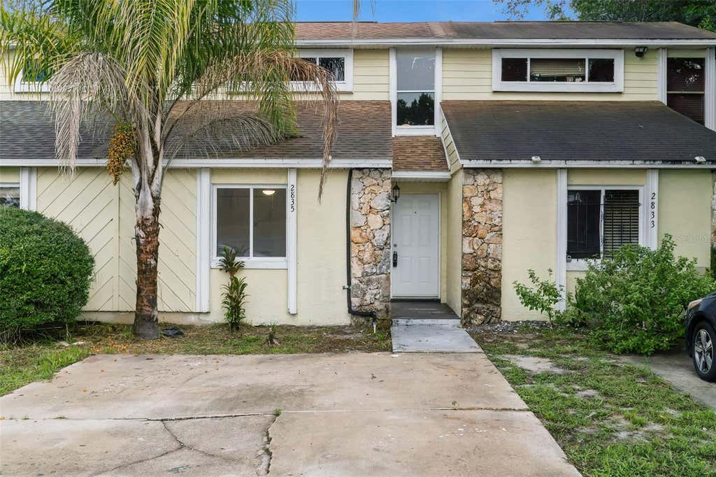 Photo of 2835 Hunt Club Lane, Orlando, FL 32826 (MLS # O6432209)