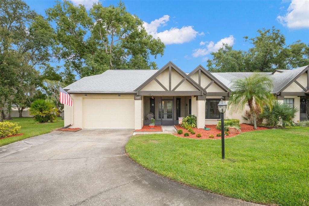 Photo of 3497 E Woodmont Way, Palm Harbor, FL 34684 (MLS # TB8442474)